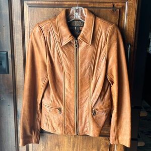 Studio Elena can tan leather jacket with zipper front. Make me an offer